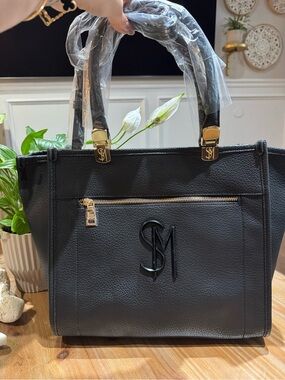 Steve Madden Black Pebbled Leather Tote with Gold Accents leopard interior